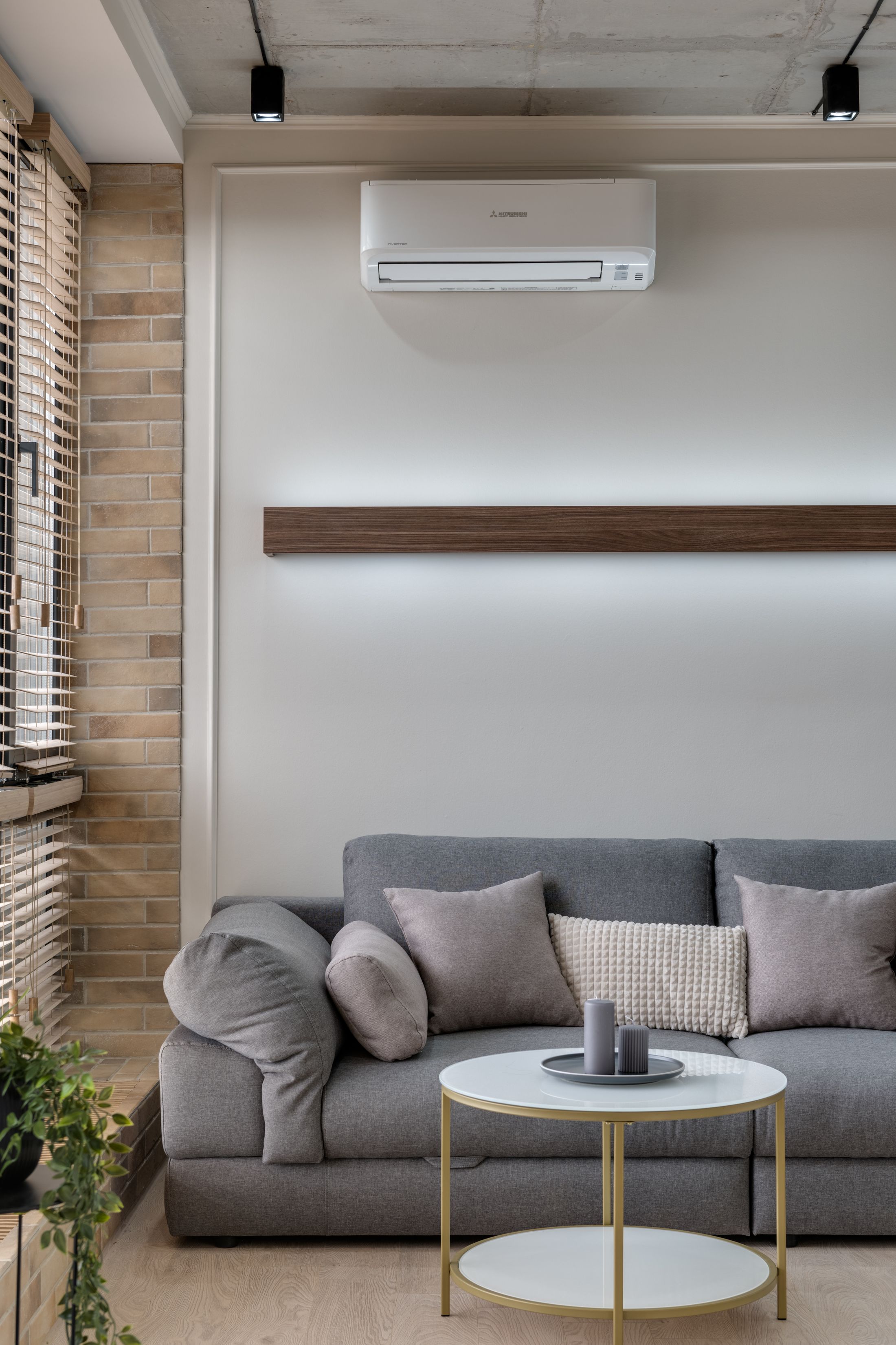 Contemporary living room with fitted air conditioning