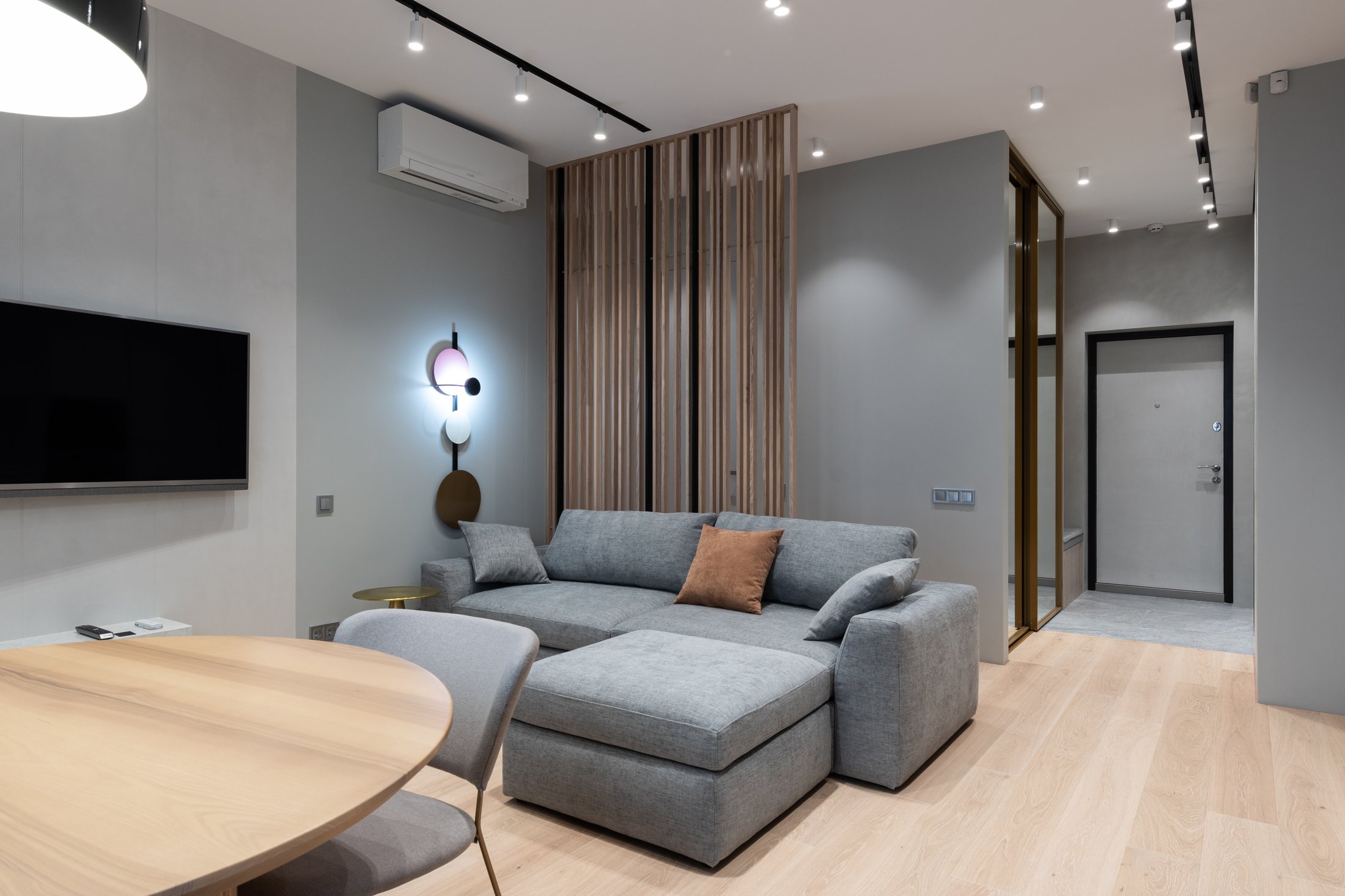 Refined lounge with a discreet air conditioning unit